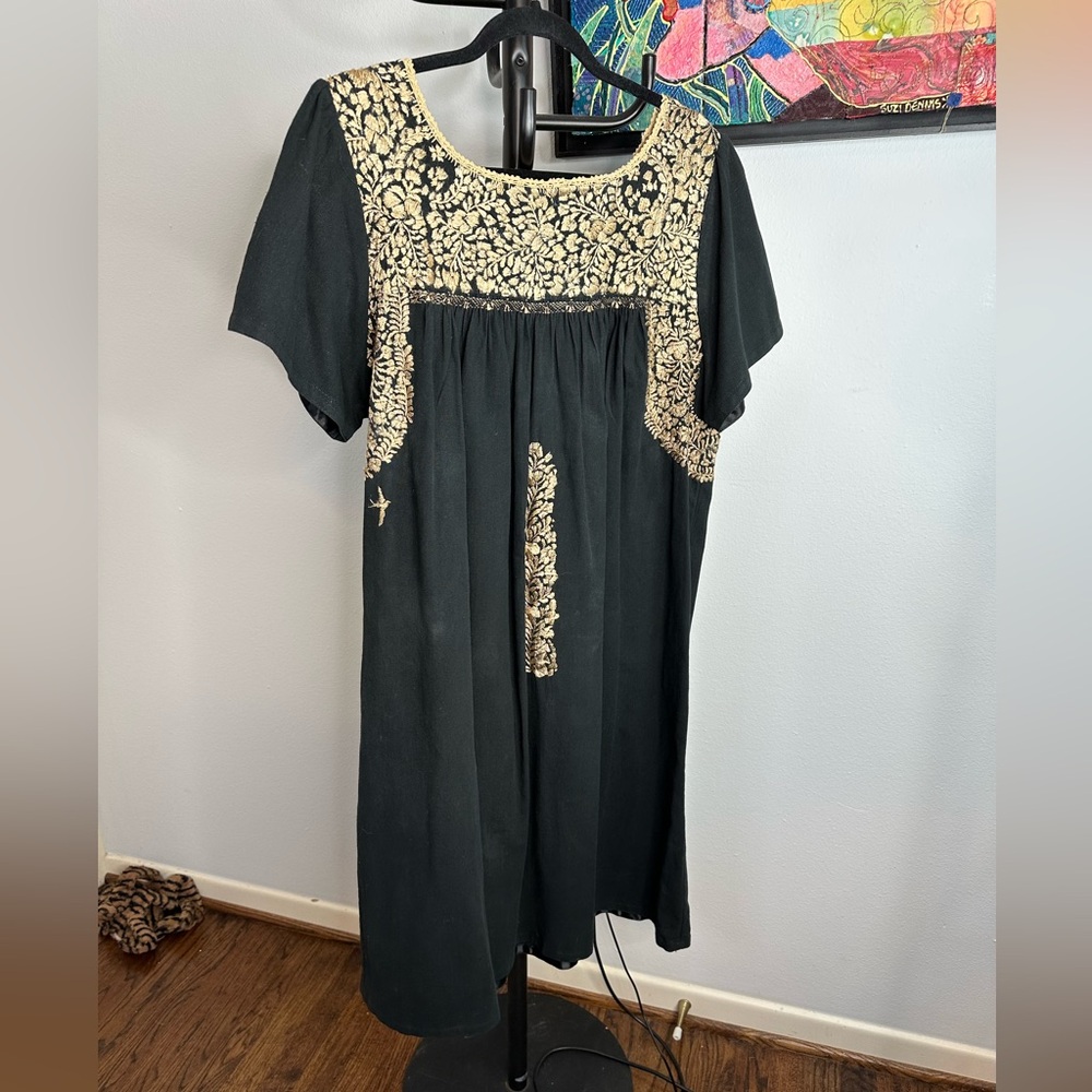 Mi Golondrina Elegant Black Dress with Gold Detailing